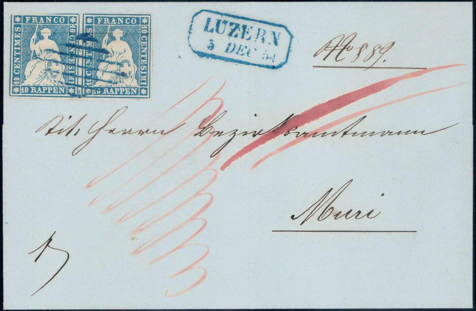 Alter Briefumschlag mit zwei blauen 10-Rappen-Briefmarken, blauem Poststempel LUZERN 5 DEC 54, roter Tinte und handschriftlicher kursiver Adresse an Monsieur Samuel Bozino, Bankier, Muri.